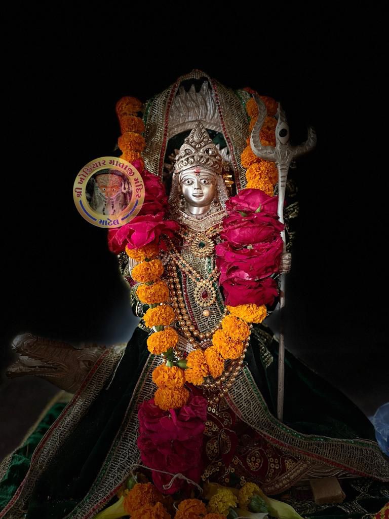 Khodiyar Maa with flowers and trident