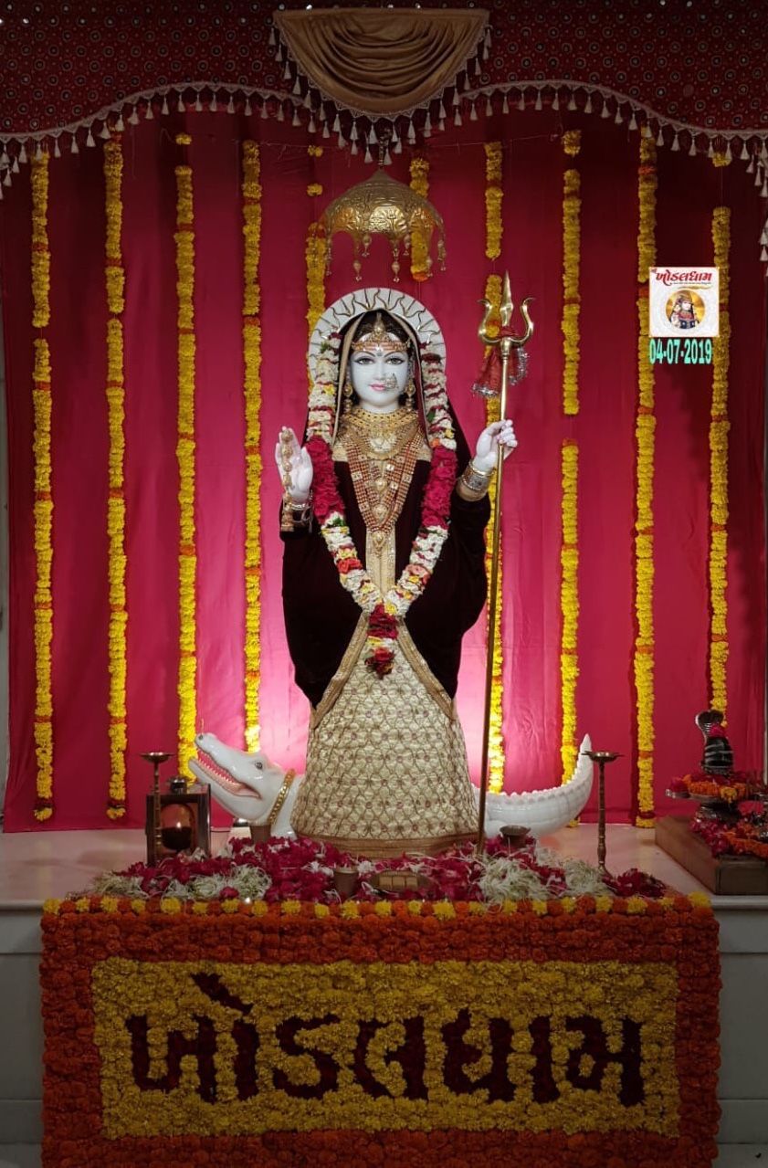 Khodiyar Maa idol in temple setting.
