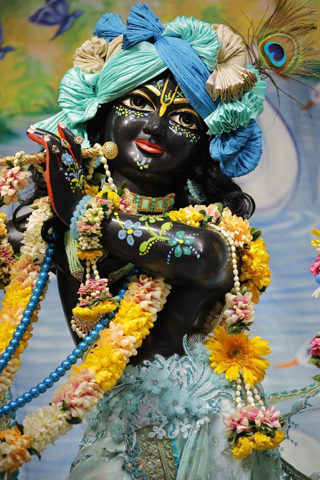 Krishna with flute and peacock feather