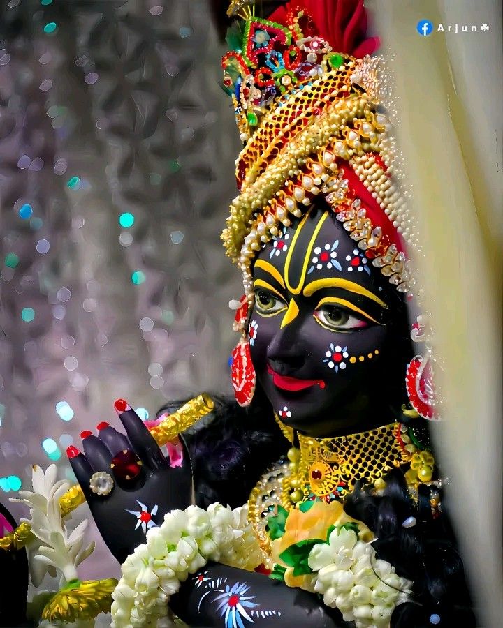 Krishna adorned with floral garlands