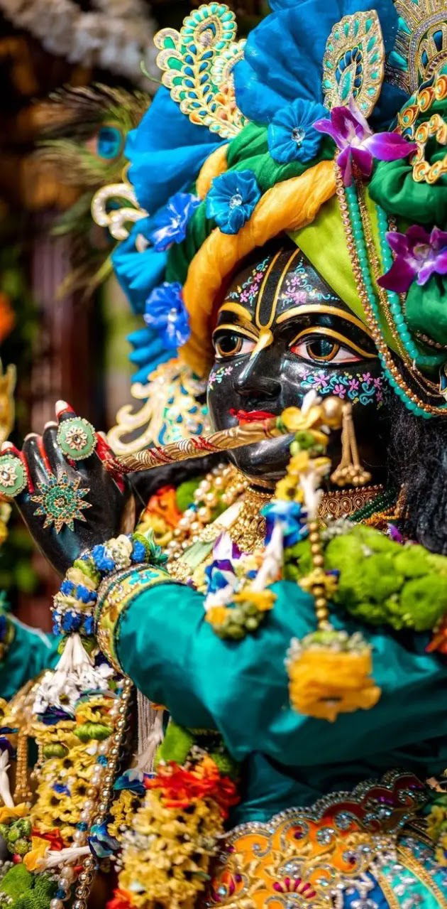 Lord Krishna with flute and peacock feather