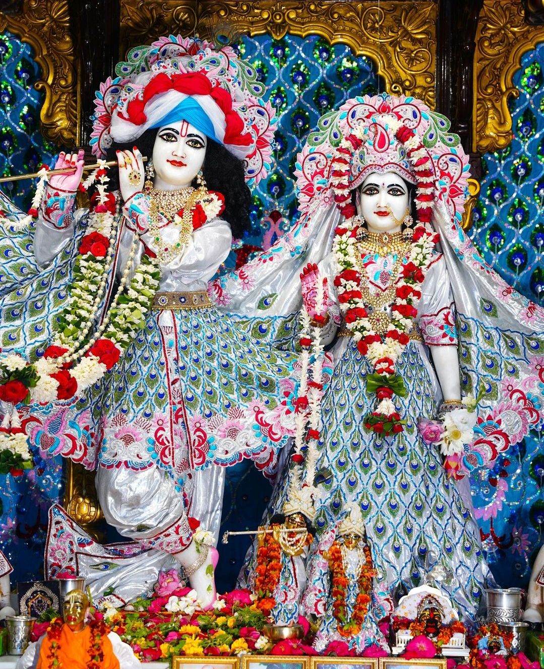 Radha and Krishna adorned with flowers