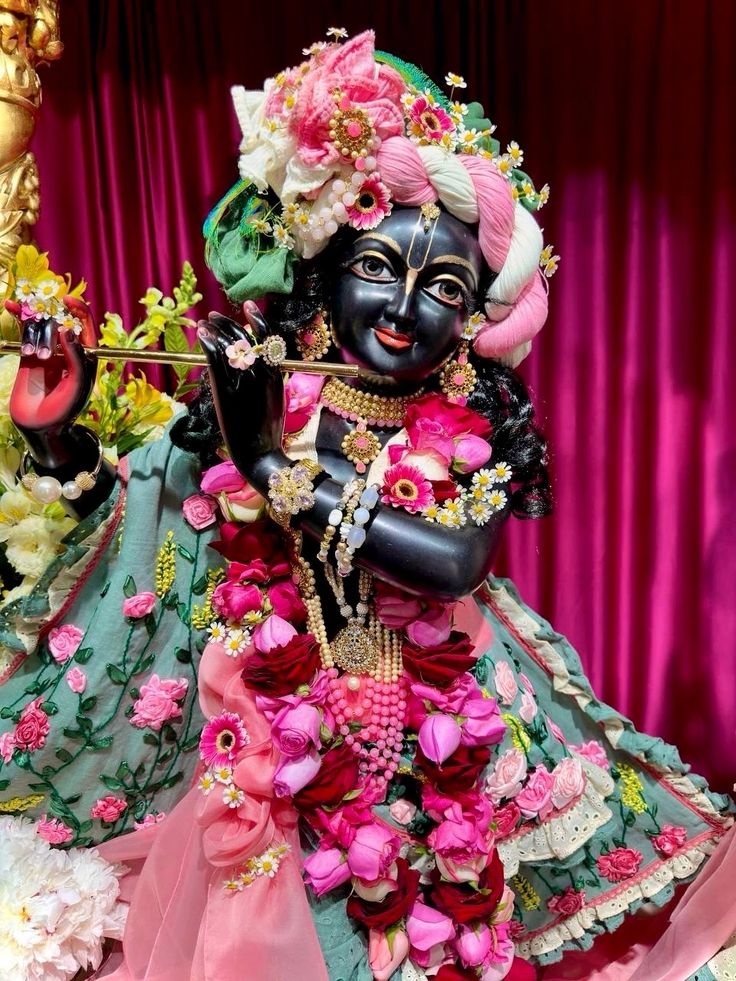 Krishna with flute and flower garland