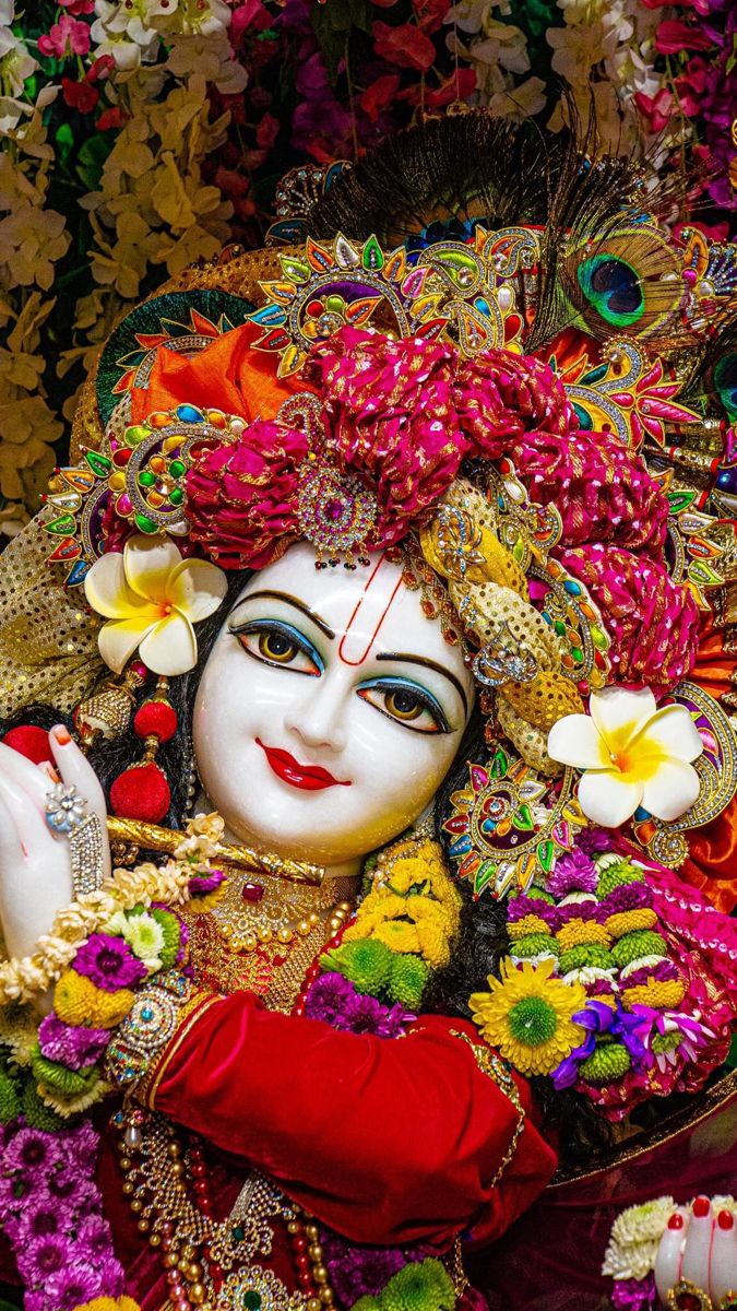 Krishna adorned with flowers, divine face