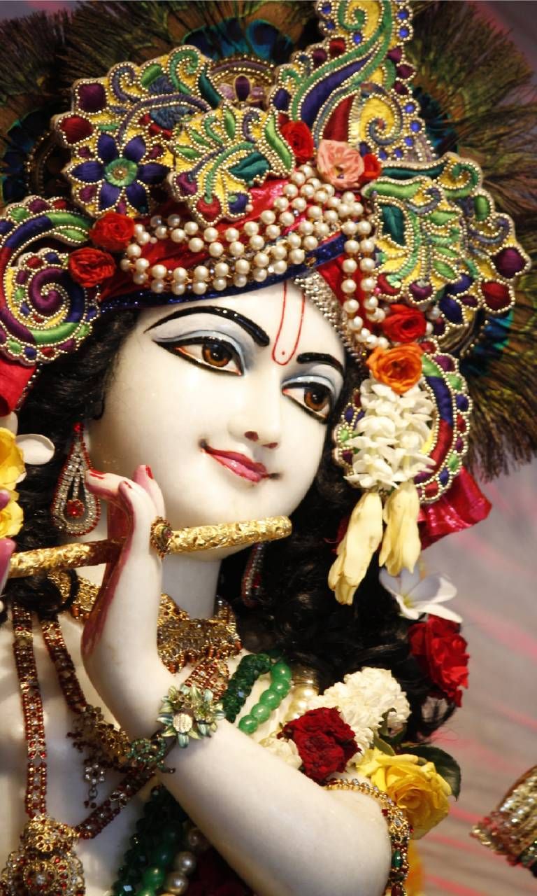 Close-up of beautifully adorned Krishna face