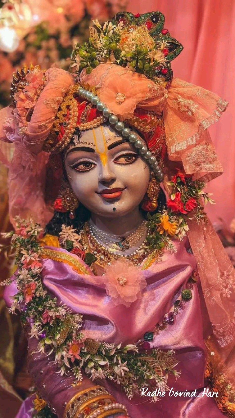 Lord Krishna adorned with flowers