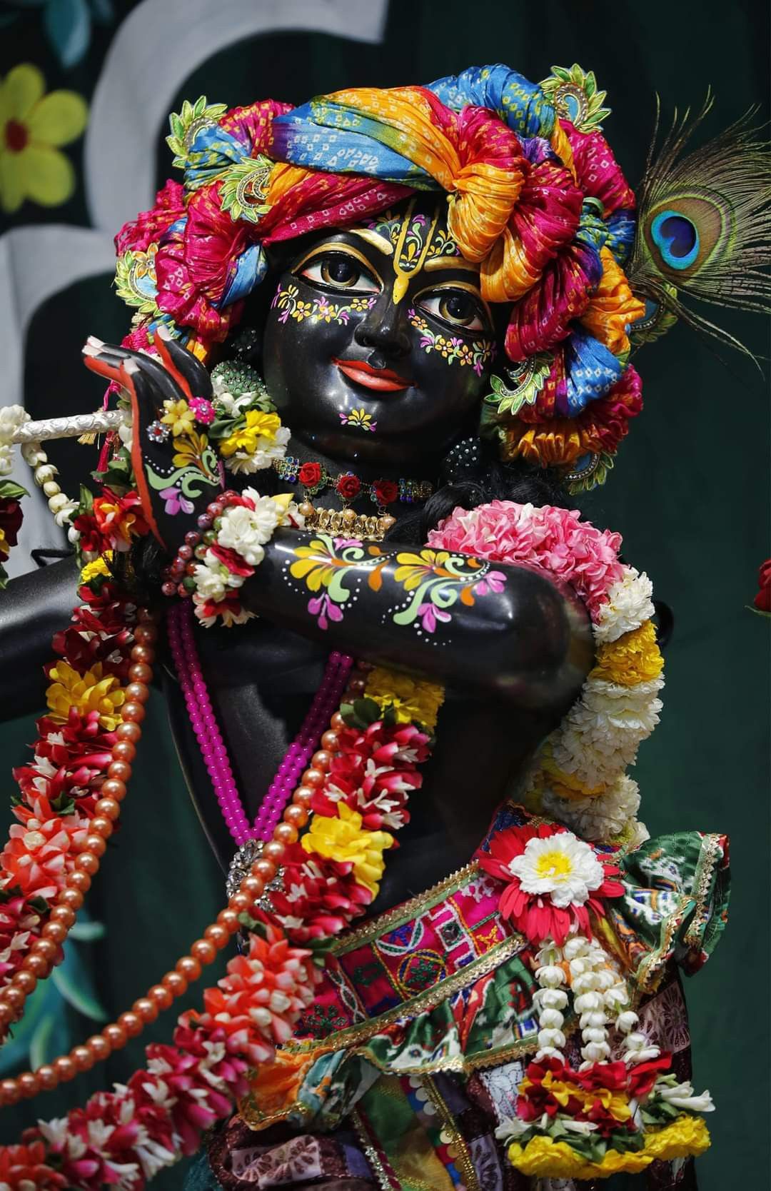 Lord Krishna with floral garland