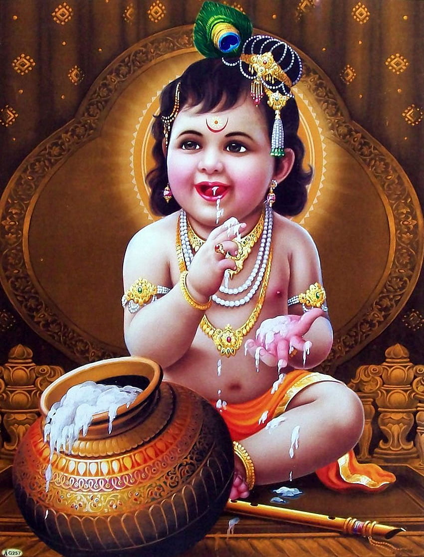 Baby Krishna stealing butter happily.