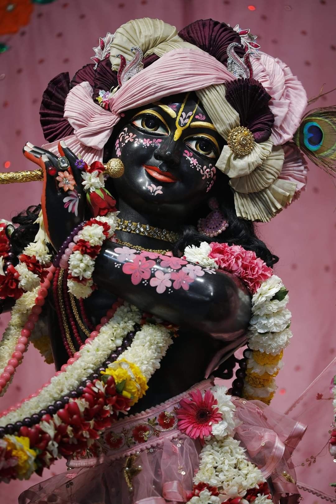 Krishna with flute and flower garland