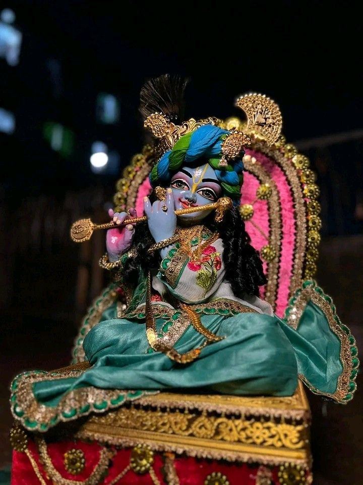 Lord Krishna playing the flute peacefully.