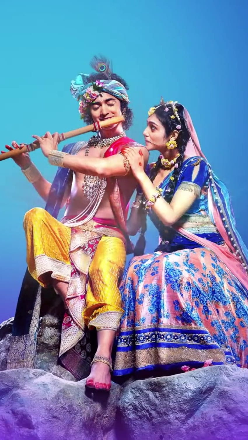 Krishna playing flute with Radha