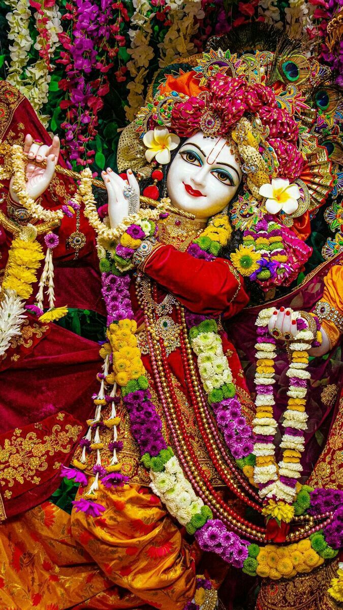 Krishna with flute and flowers