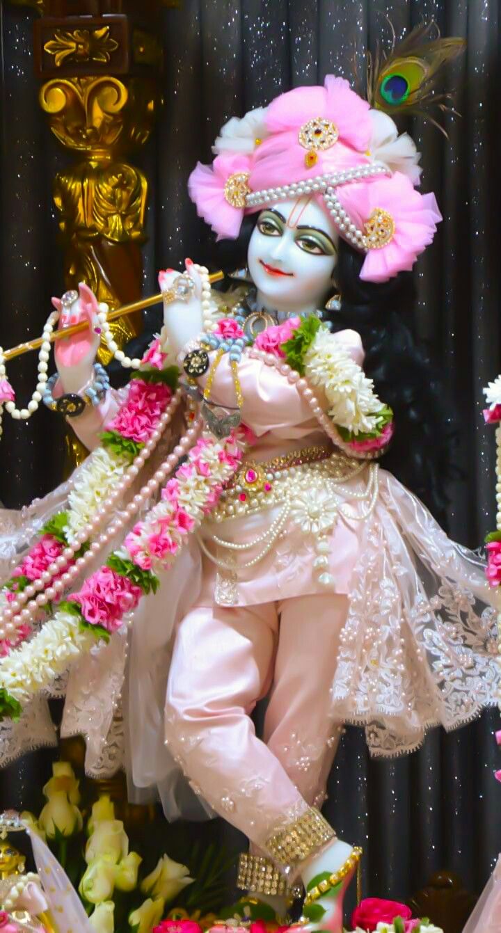 Krishna playing flute with flowers