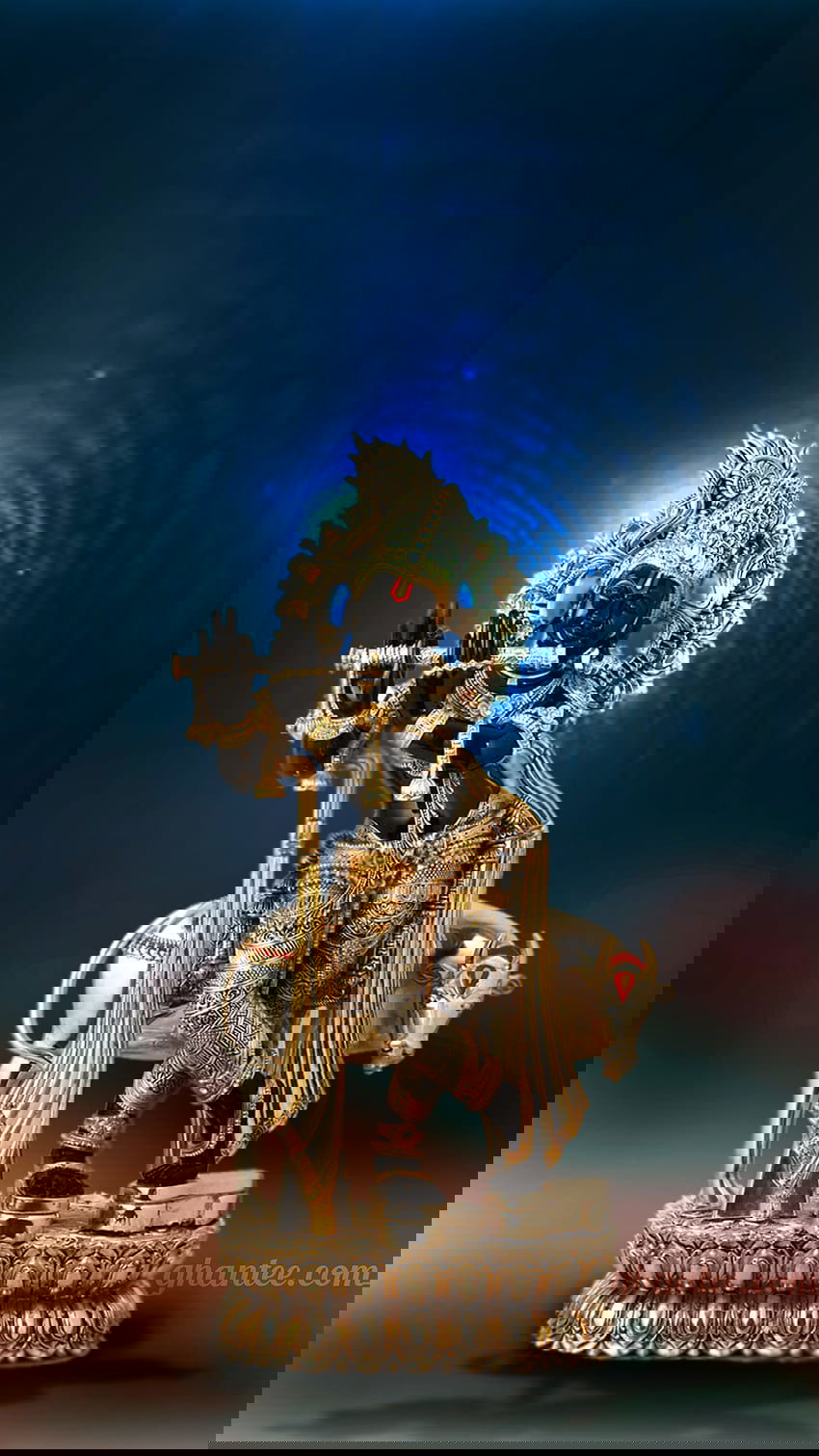 Lord Krishna playing the flute statue