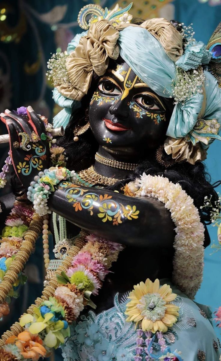 Krishna adorned with fragrant flowers