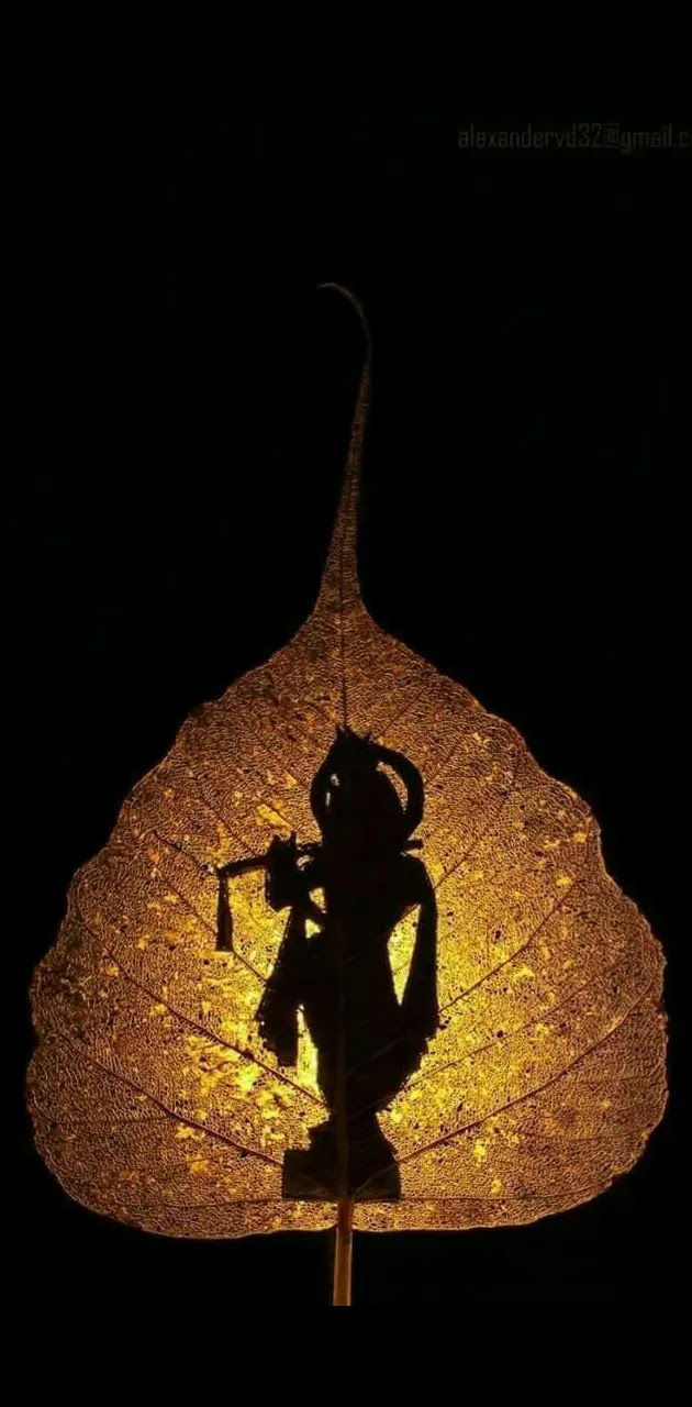 Krishna silhouette on pipal leaf