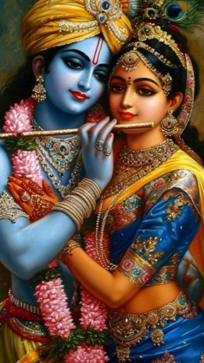 Radha and Krishna share a loving moment.