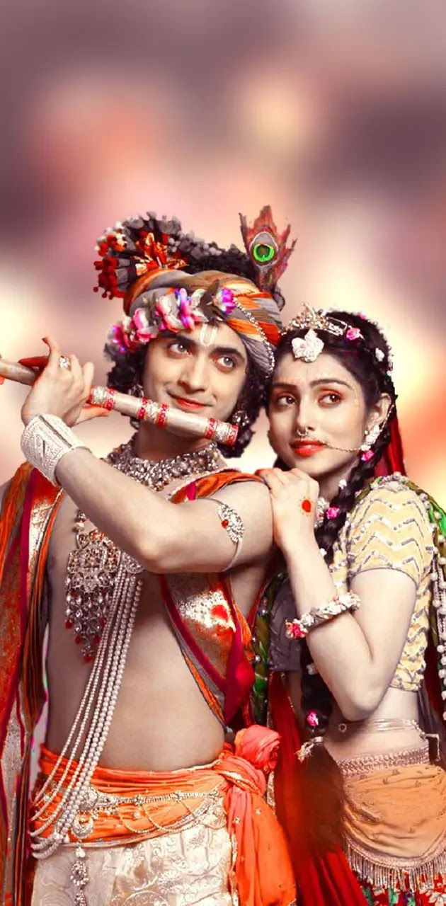 Radha and Krishna share loving embrace