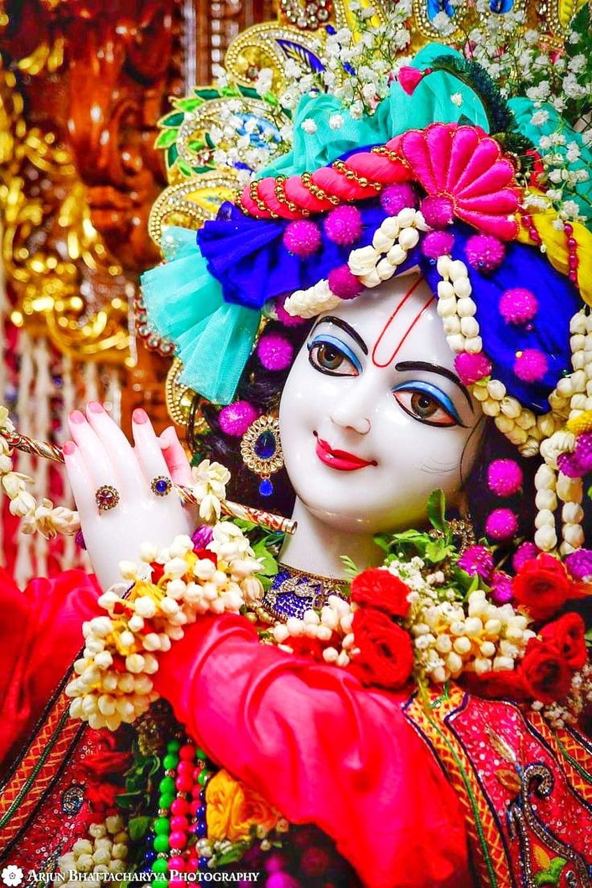 Krishna with vibrant floral adornments