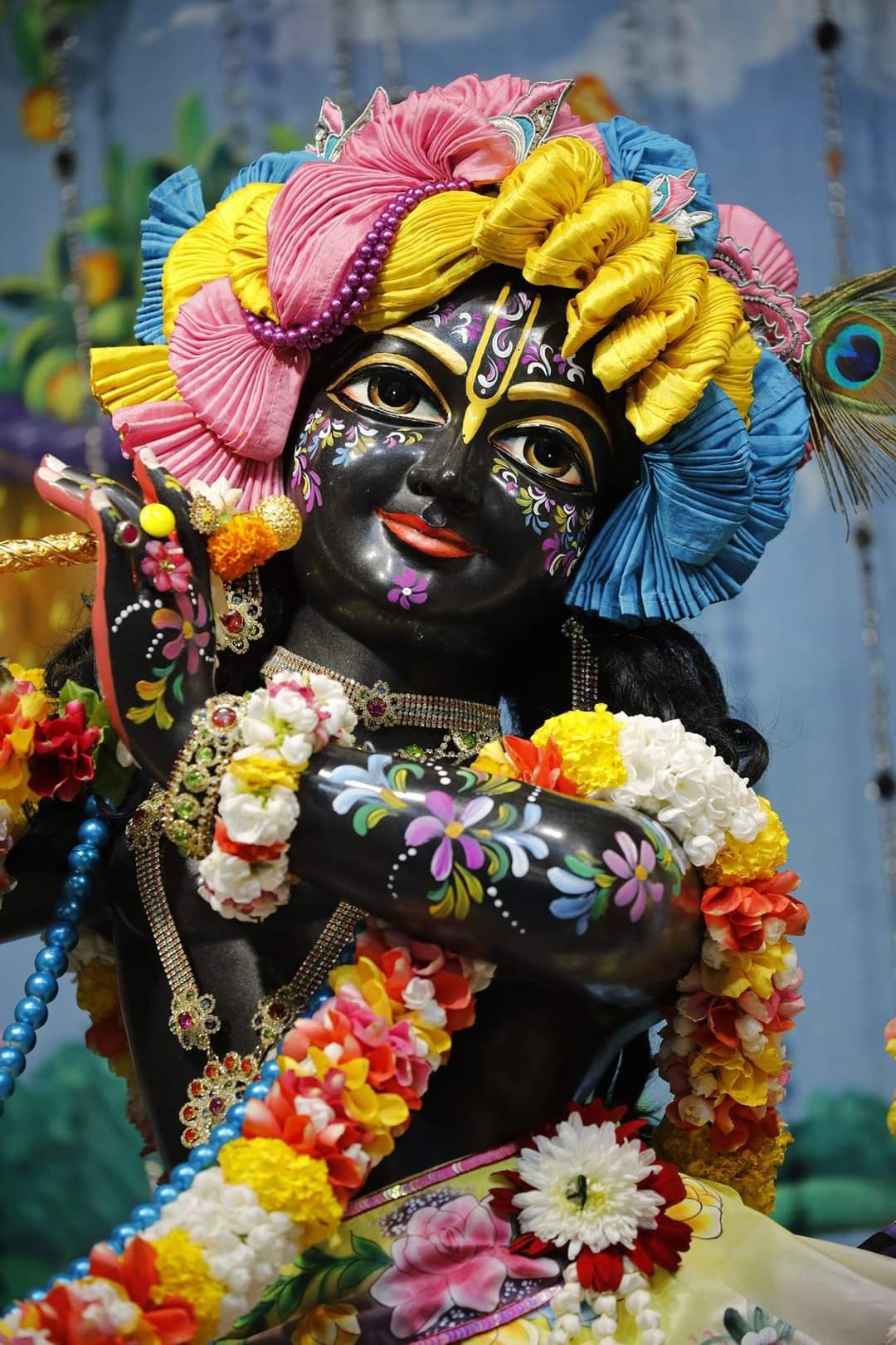 Lord Krishna adorned with flowers