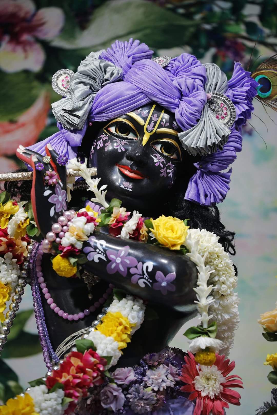Lord Krishna with floral garland