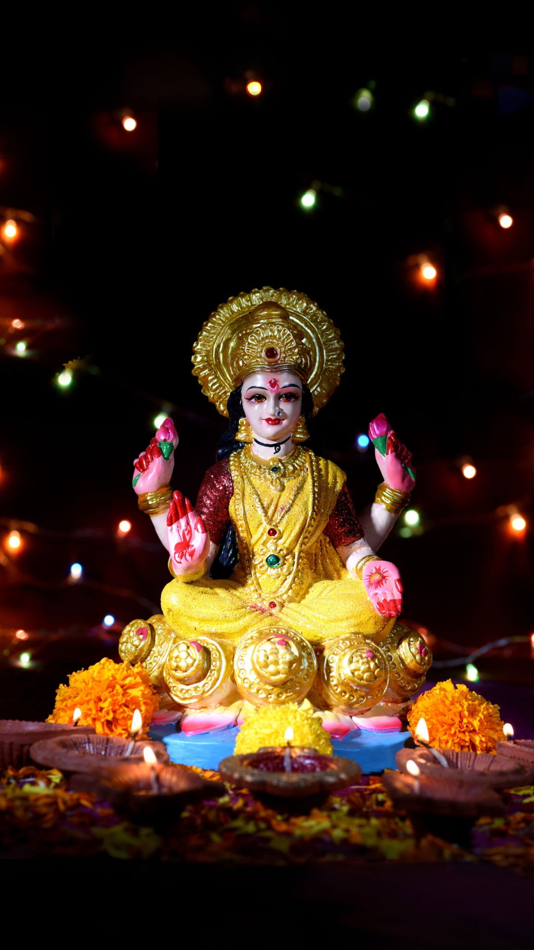 Goddess Lakshmi seated amidst Diwali lights