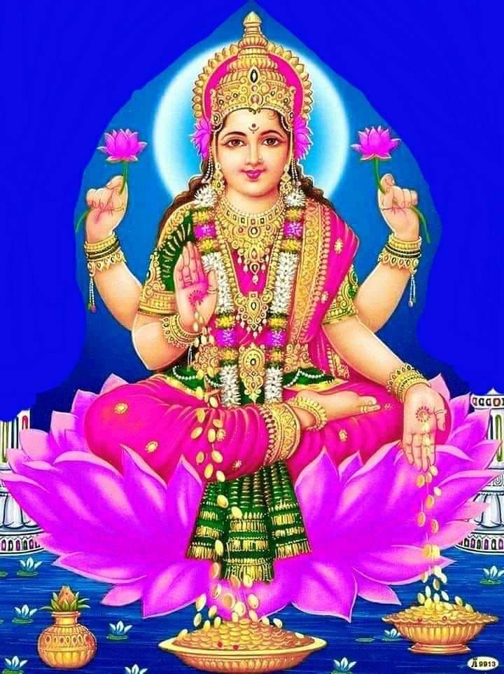 Goddess Lakshmi seated on a lotus.