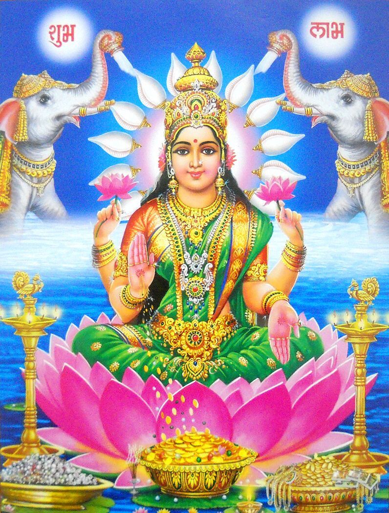 Lakshmi Maa seated on lotus flower