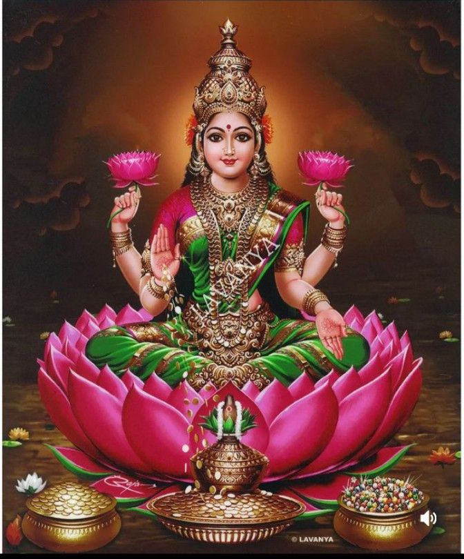Lakshmi Maa on a pink lotus.