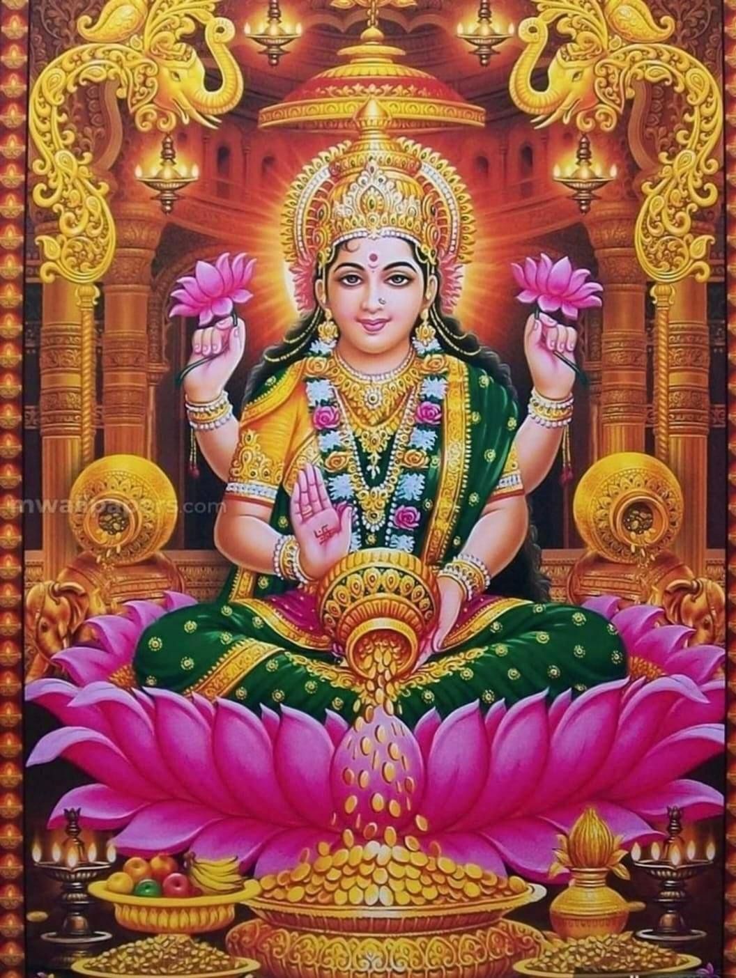 Lakshmi Maa seated on a lotus flower