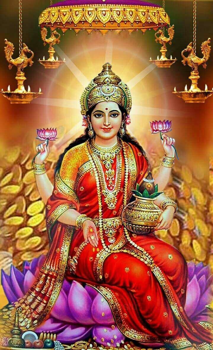Lakshmi Maa seated on a lotus.