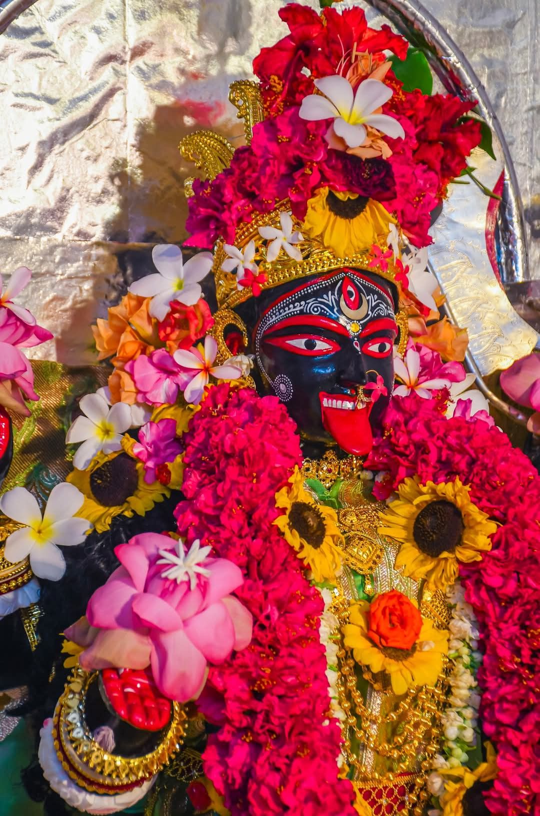 Mahakali Maa adorned with colorful flowers
