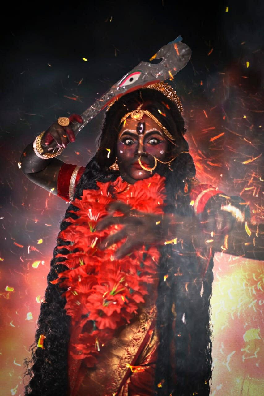 Mahakali Maa wielding a fiery sword