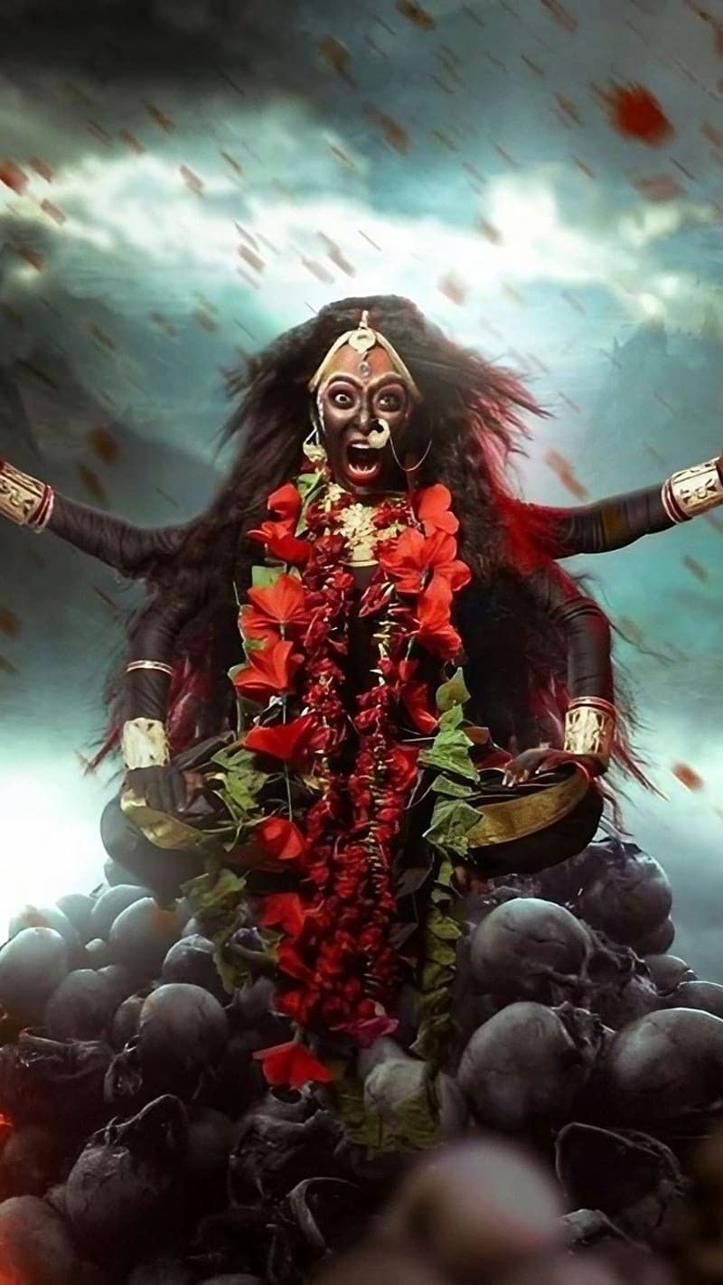 Fierce Mahakali Maa amidst skulls and flowers