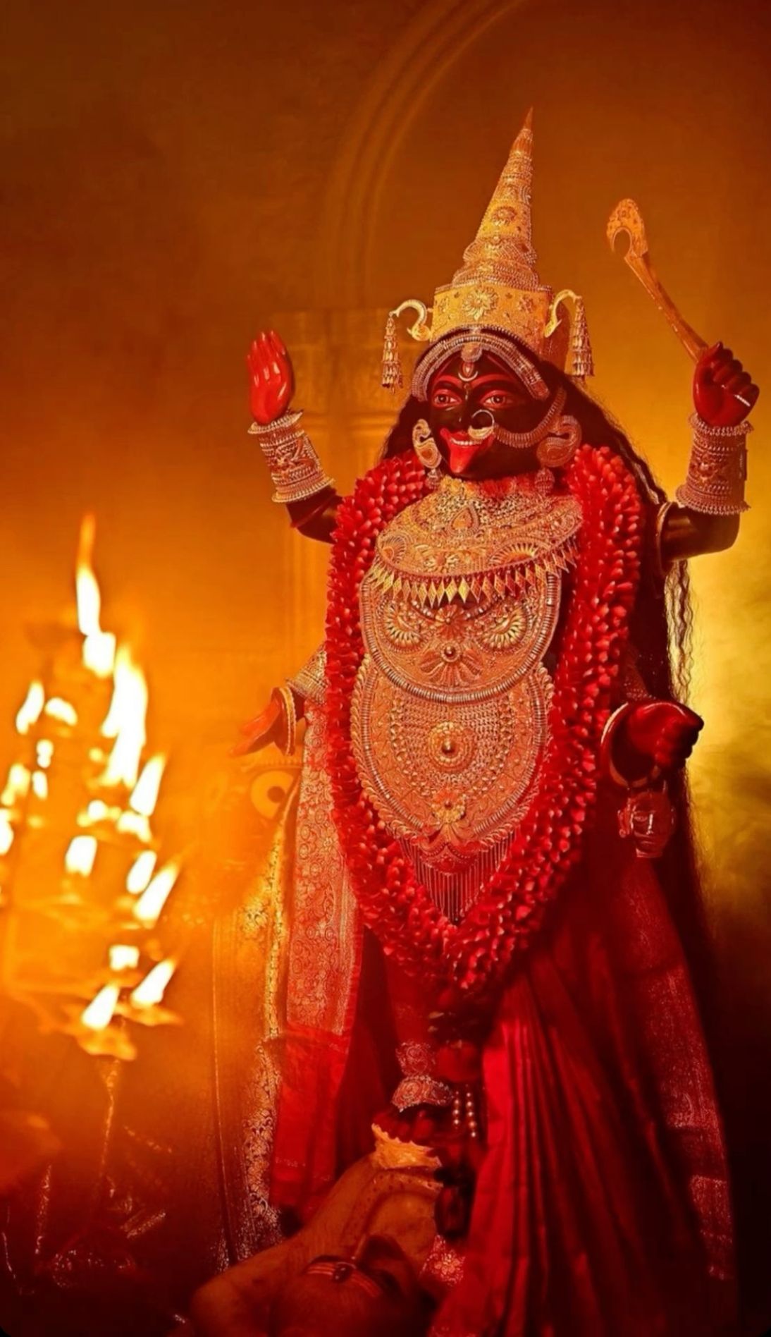 Goddess Mahakali amidst fiery devotion.