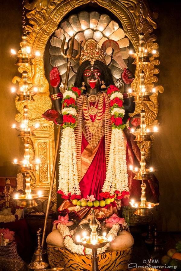 Mahakali Maa with vibrant floral offerings
