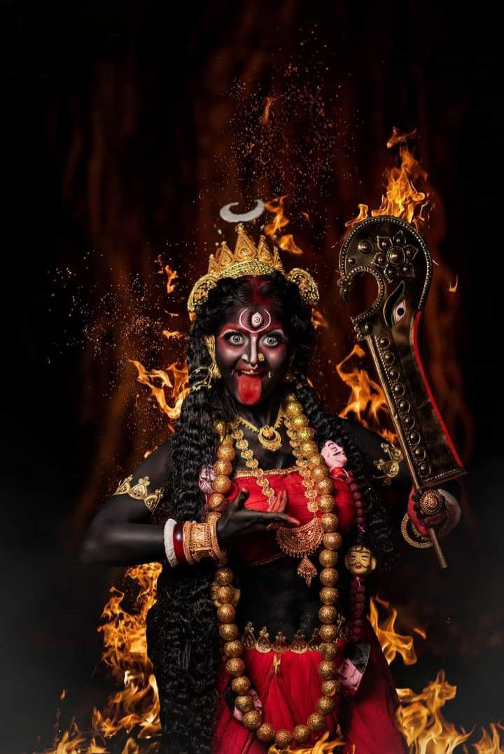 Goddess Kali amidst fiery background