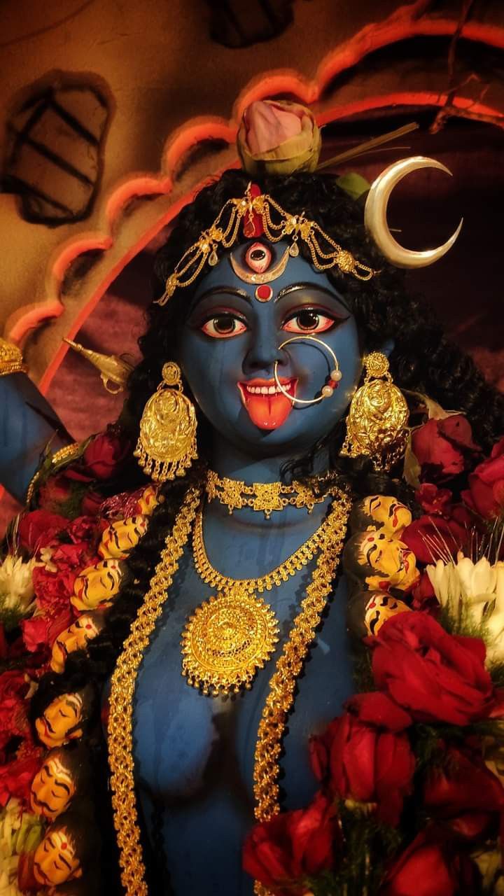 Goddess Kali with flowers and jewelry
