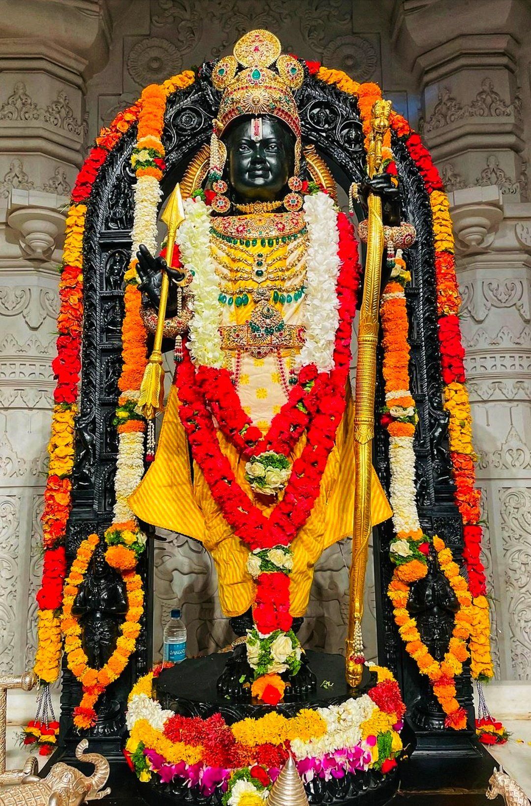 Lord Ram with bow and floral garland