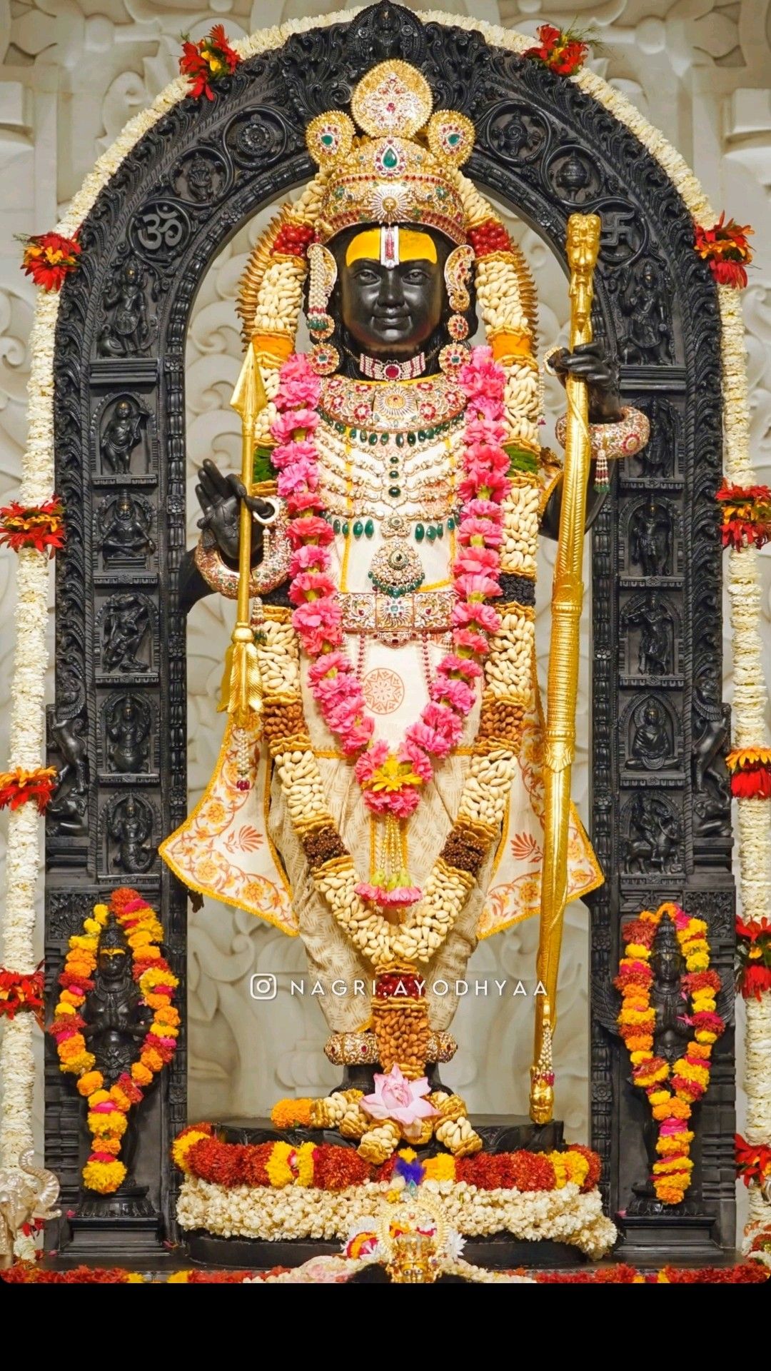 Lord Ram idol adorned with flowers