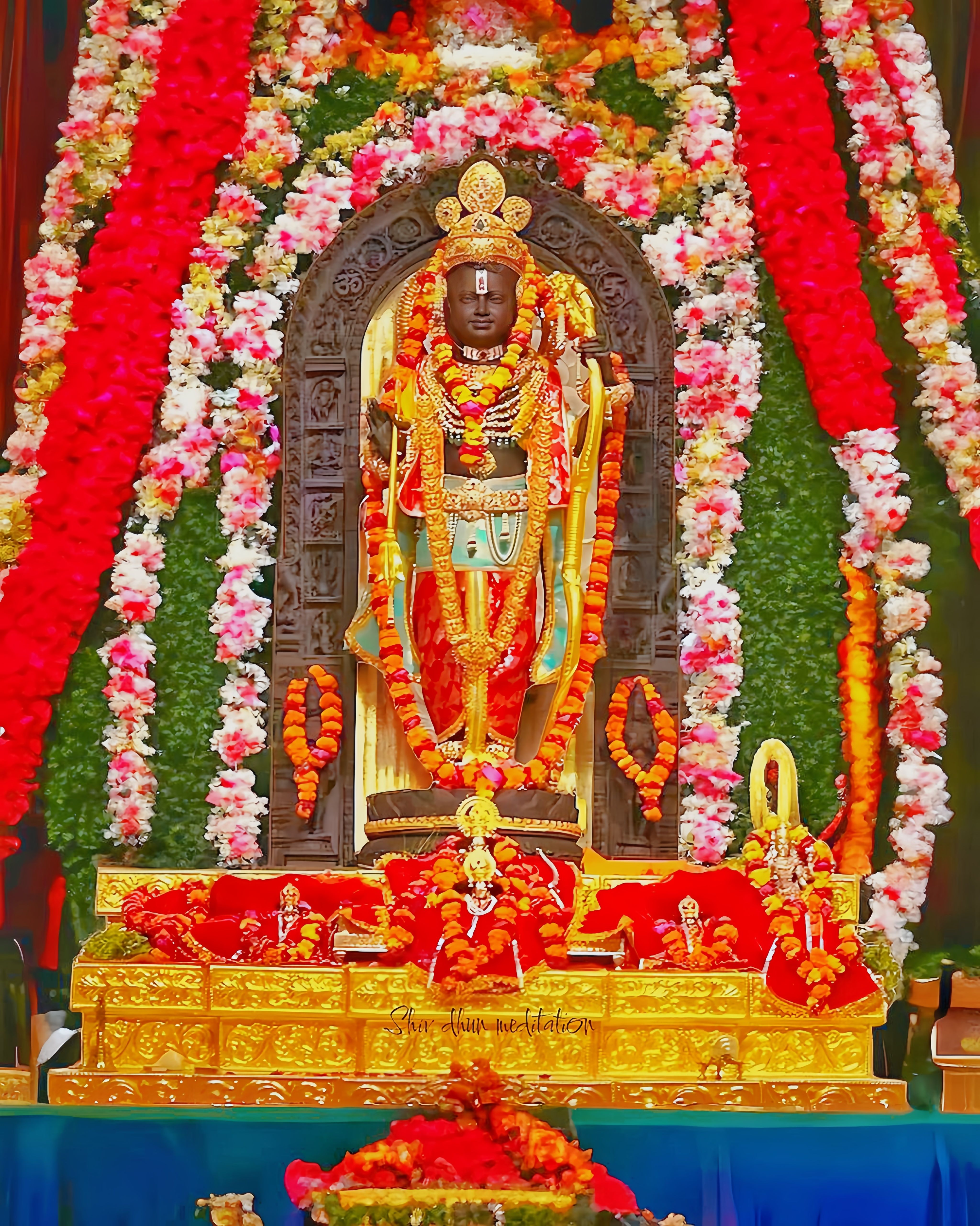 Lord Ram idol surrounded by vibrant flowers