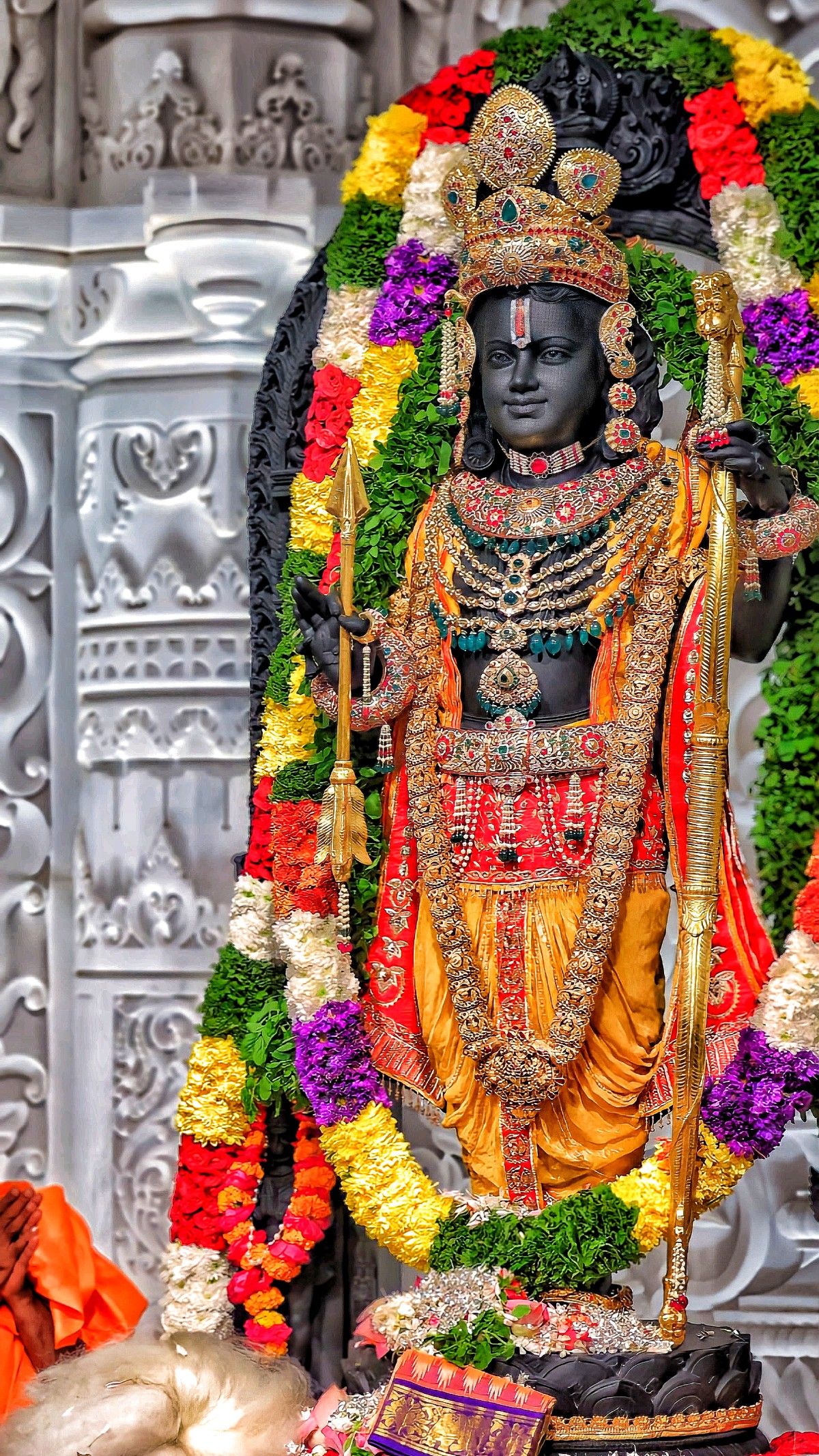 Lord Ram statue with bow and arrow