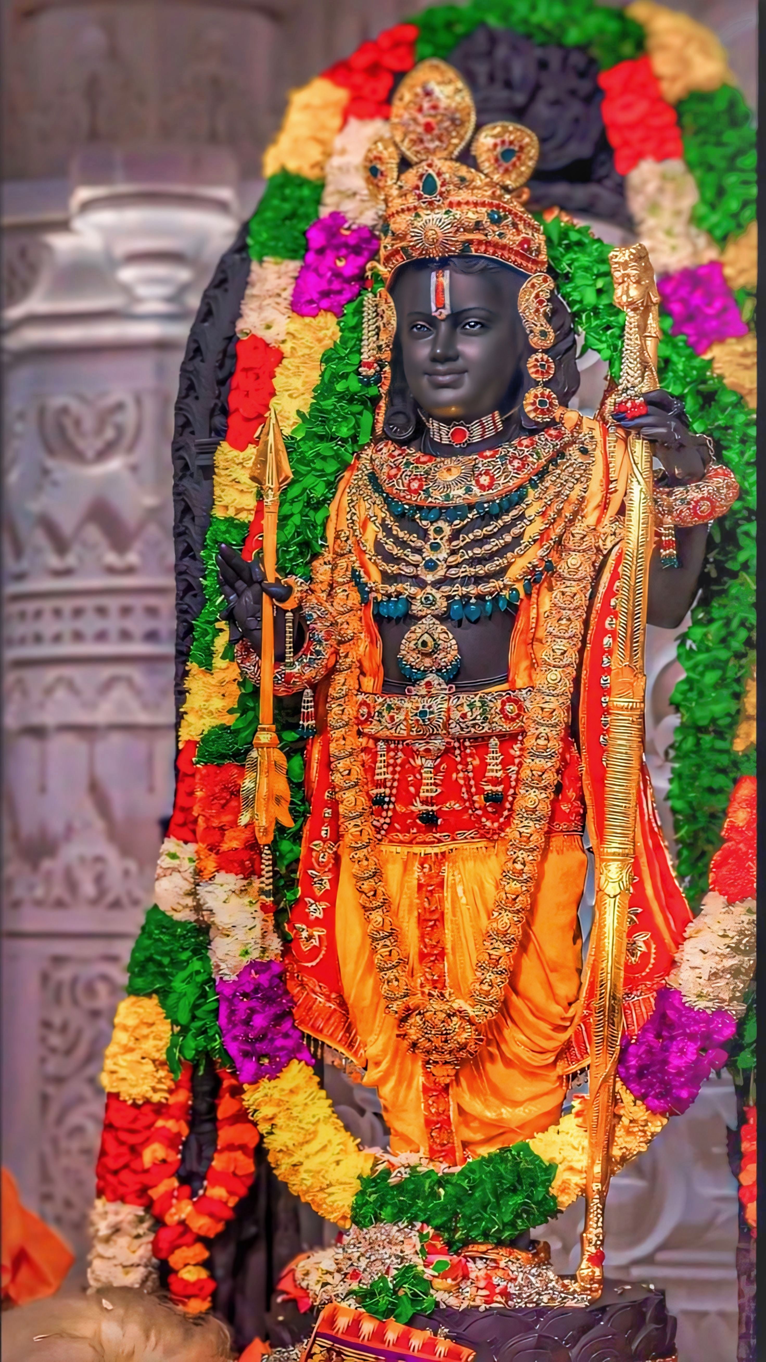 Lord Ram with bow and flower garland