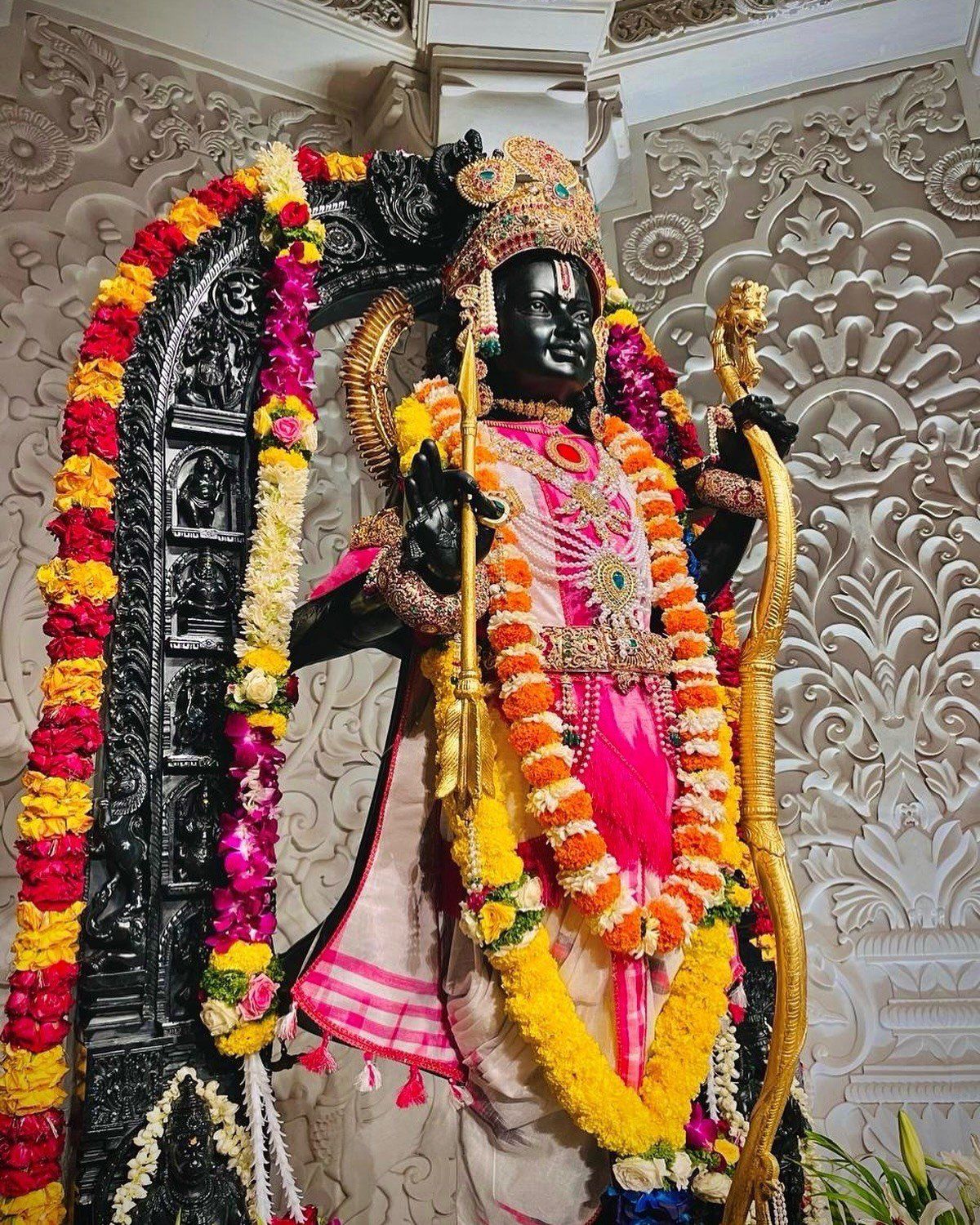 Lord Ram with bow and floral garland