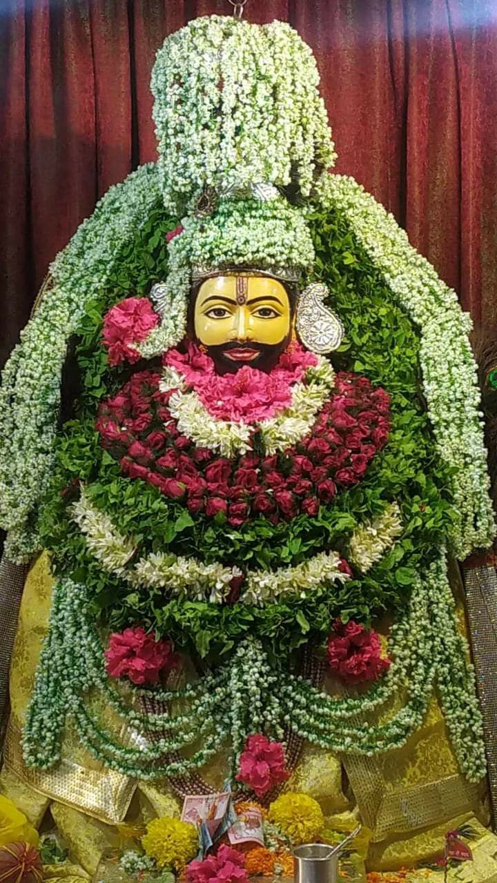 Ramdevpir adorned with floral garlands