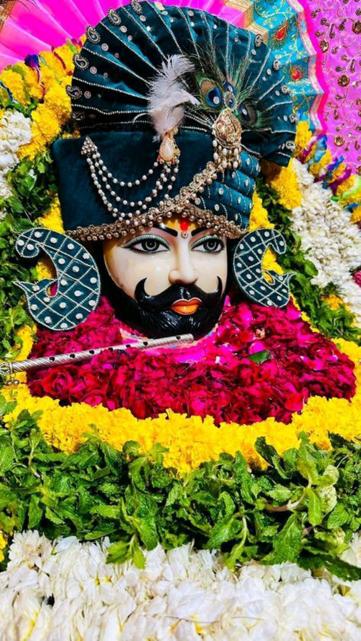 Ramdevpir Ji with flower garlands
