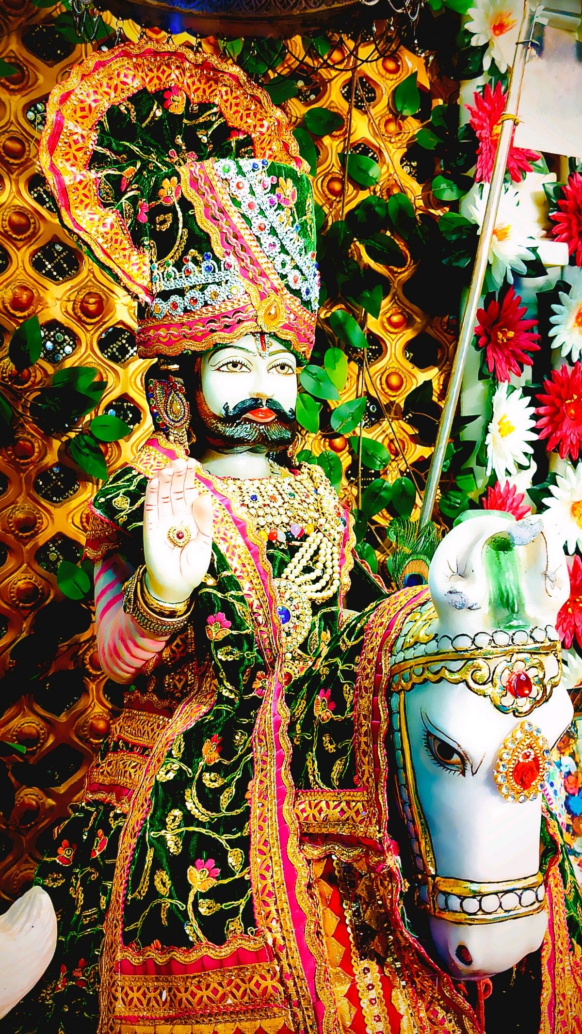 Ramdevpir seated on a white horse