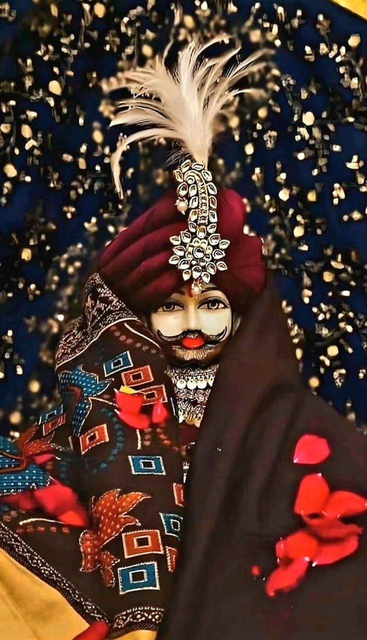 Ramdev Pir adorned with turban and flowers