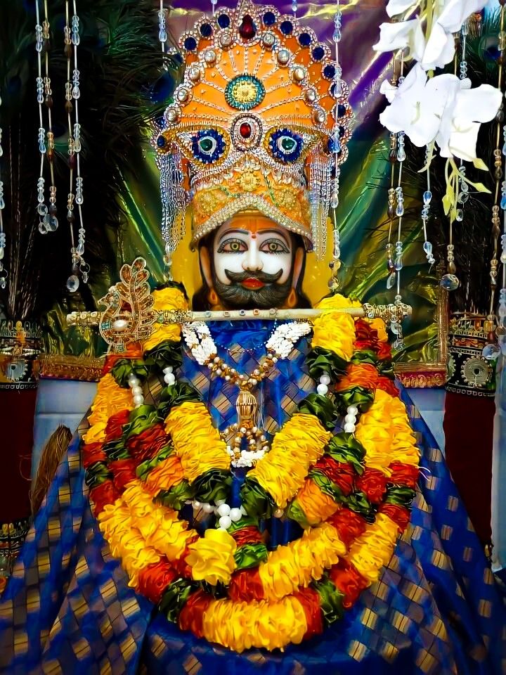 Ramdevpir adorned with marigold garland