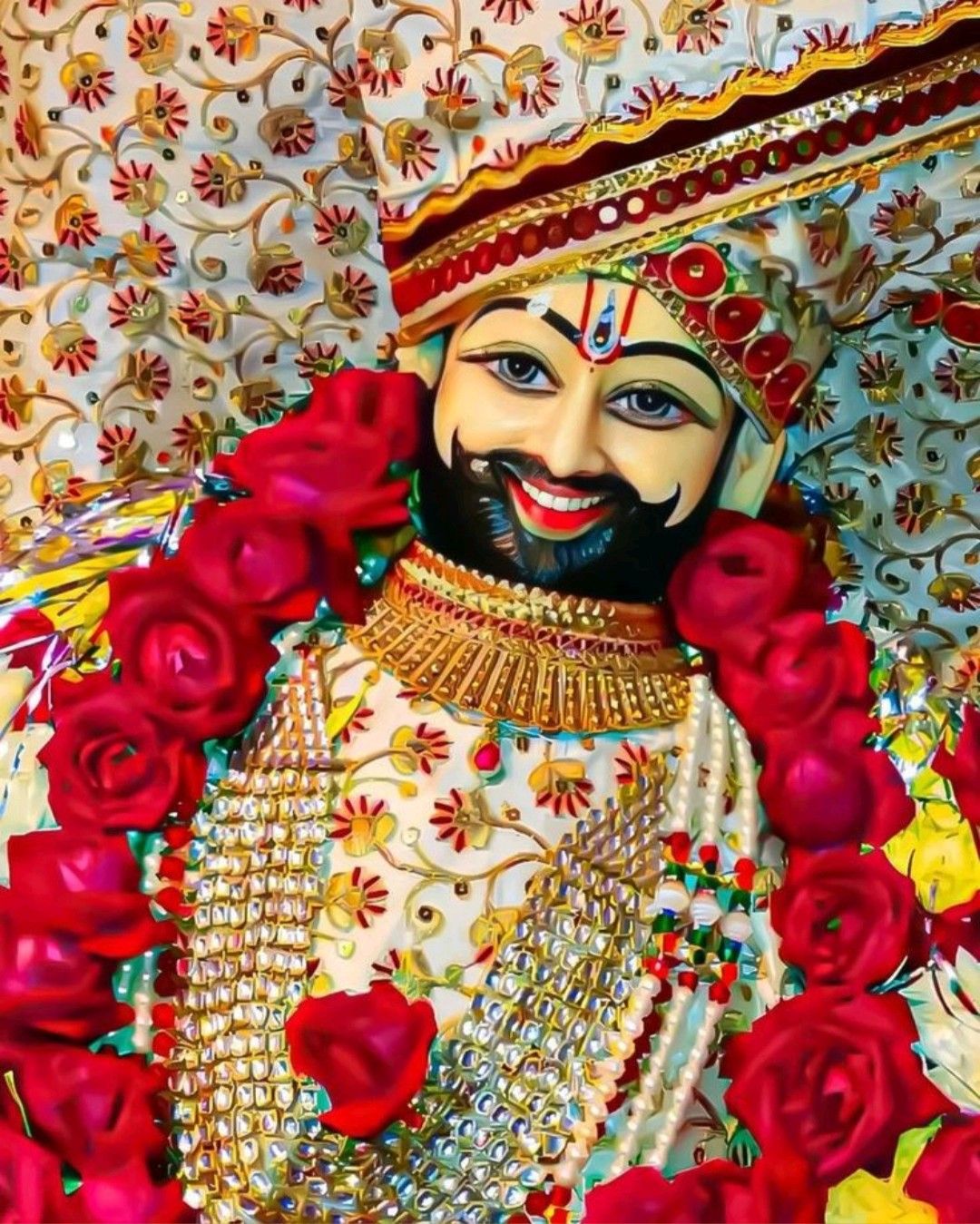 Ramdevpir with red roses garland